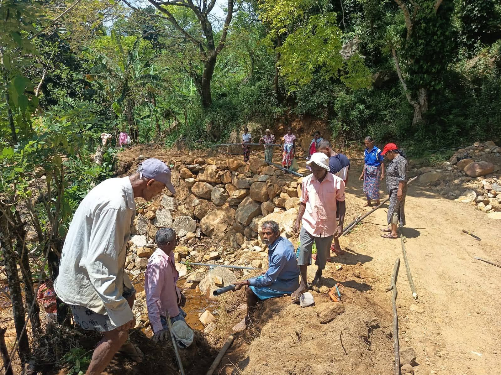 CDC team and volunteers working on debris clearance and emergency response in Dittawa