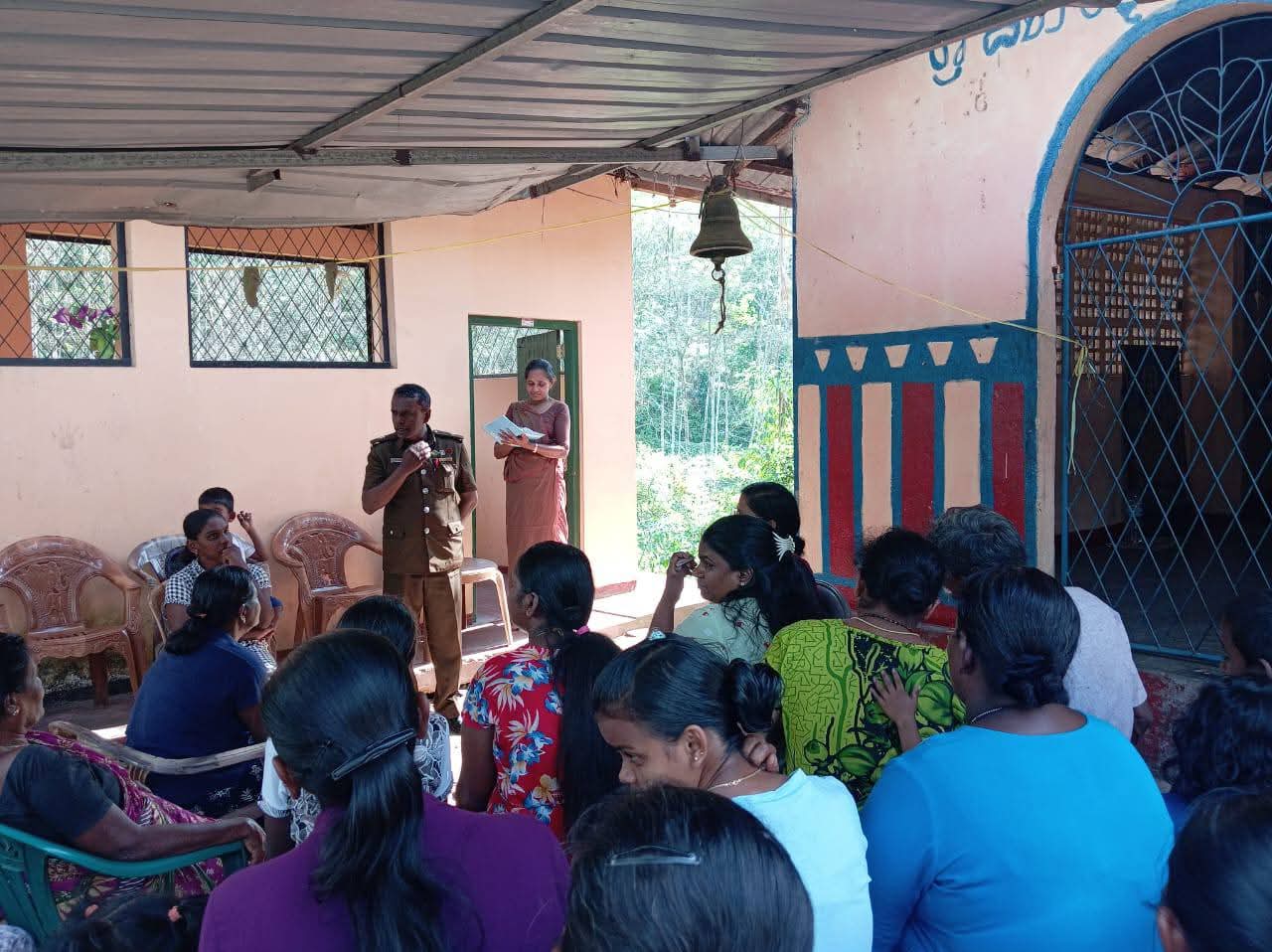 Community members participating in the Aranayaka health awareness programme with public health inspectors
