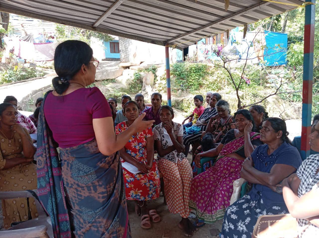Families from the estate community engaging in health and household cleanliness awareness activities