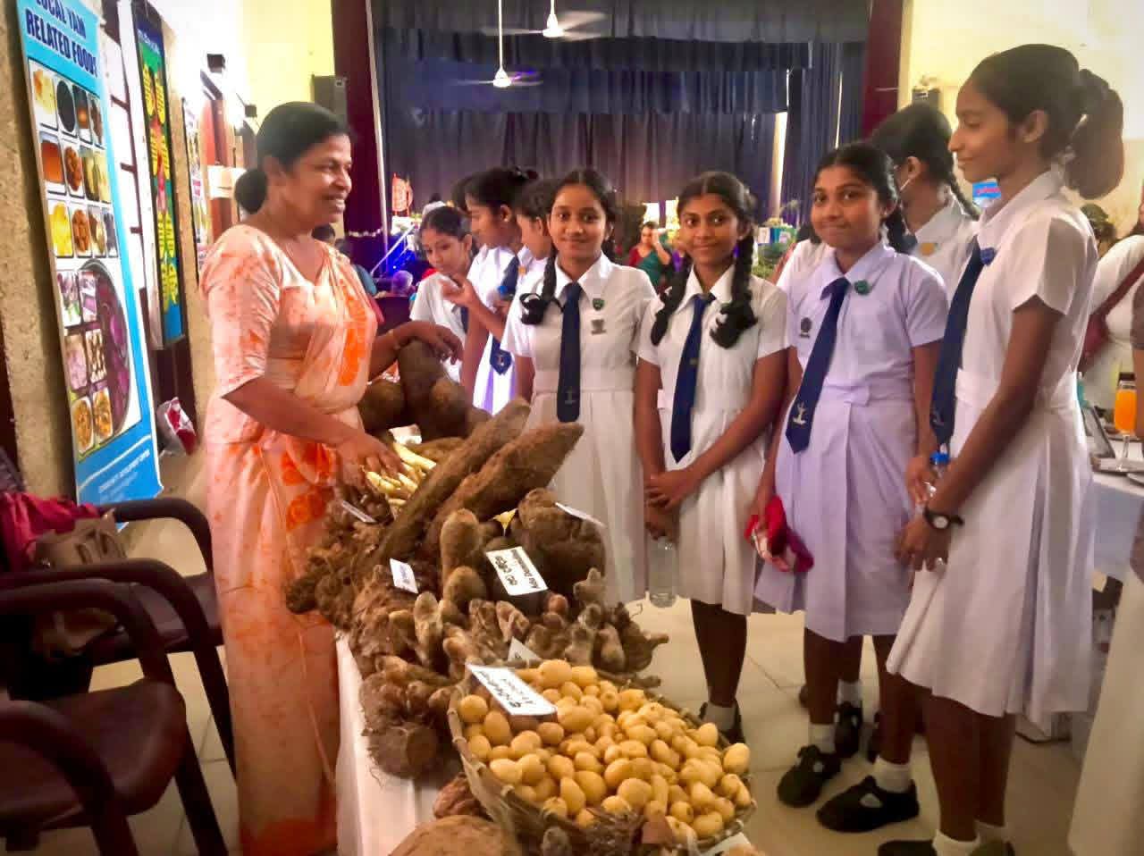 Traditional Sri Lankan food products and participants at the workshop in Kegalle