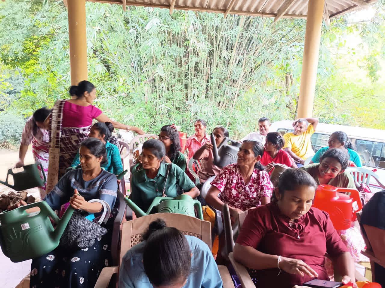 Families participating in home gardening training and local food awareness activities